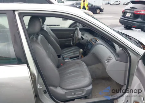 2000 Toyota Avalon Xls z USA, uszkodzony, nr VIN 4T1BF28B2YU010120